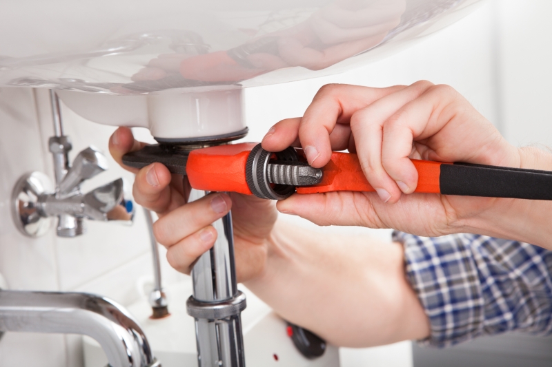 Emergency plumber attending a job in Camden Town